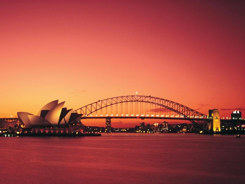 Sydney and the Opera House and Bridge at sunset