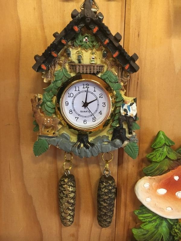 Tamborine Mountain Gallery Walkway cuckoo clock hanging on a wall.