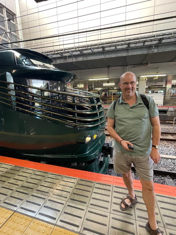 Doug and a train in Japan