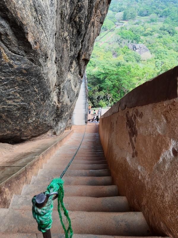 Climbing Sigiriya steps