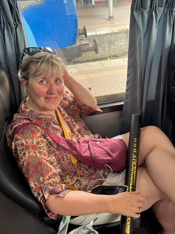 Episode 59 lady sitting on a train in Sri Lanka