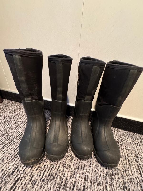 Rows of rubber muck boots provided on board for Antarctica landings